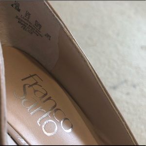Franco Sarto pointed close-toed beige wedge heel.